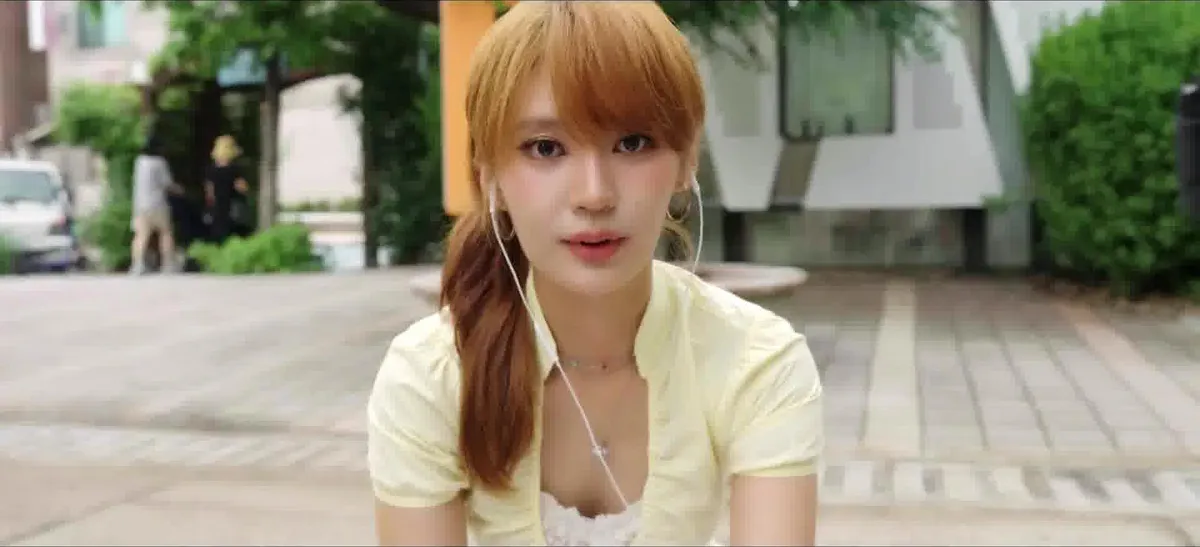 VIOLA 'Mysterious Girl' Music Video Teaser: A person wearing earphones stares into the camera — YouTube: VIOLA