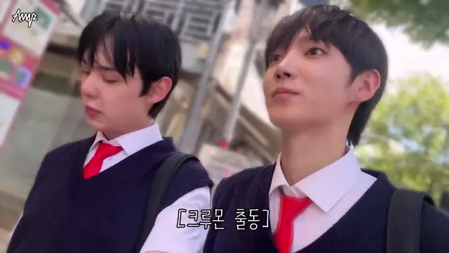 AxMxP Members Seen Walking the Streets in Postman Concept Outfits in Official Vlog