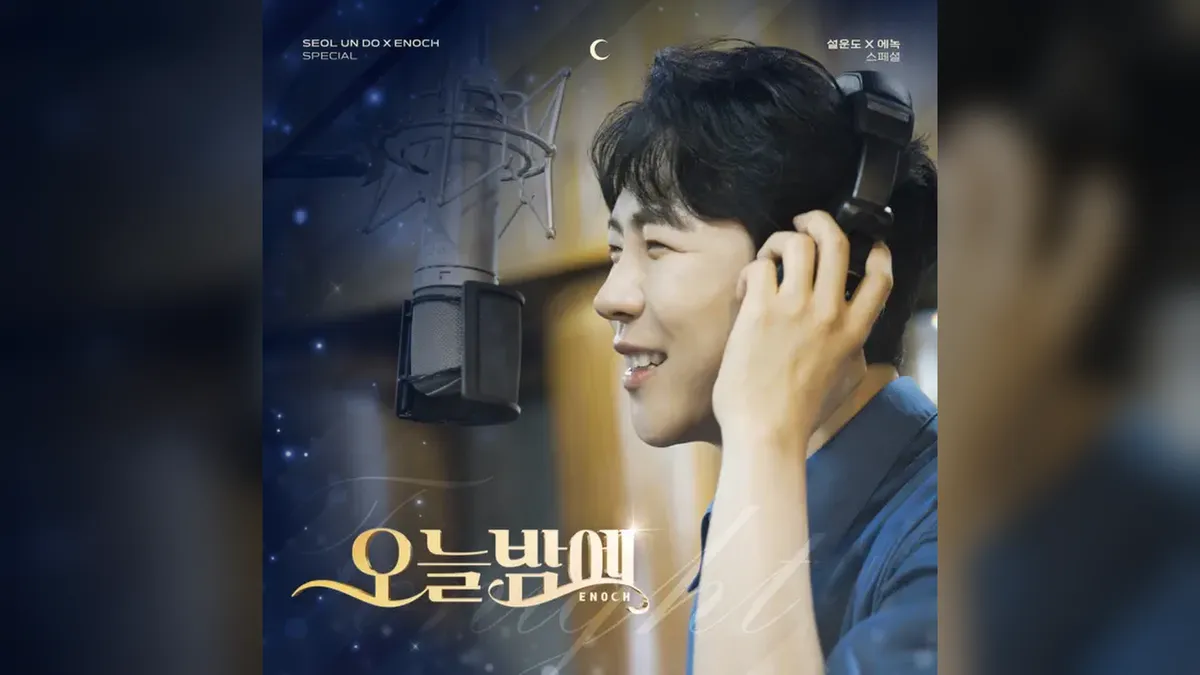 Enoch Signs Special Album for Fans Ahead of Solo Concert